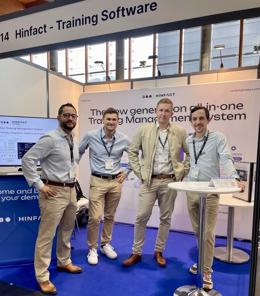 Four members of the Hinfact team on booth 314 at EATS 2024 in Cascais.